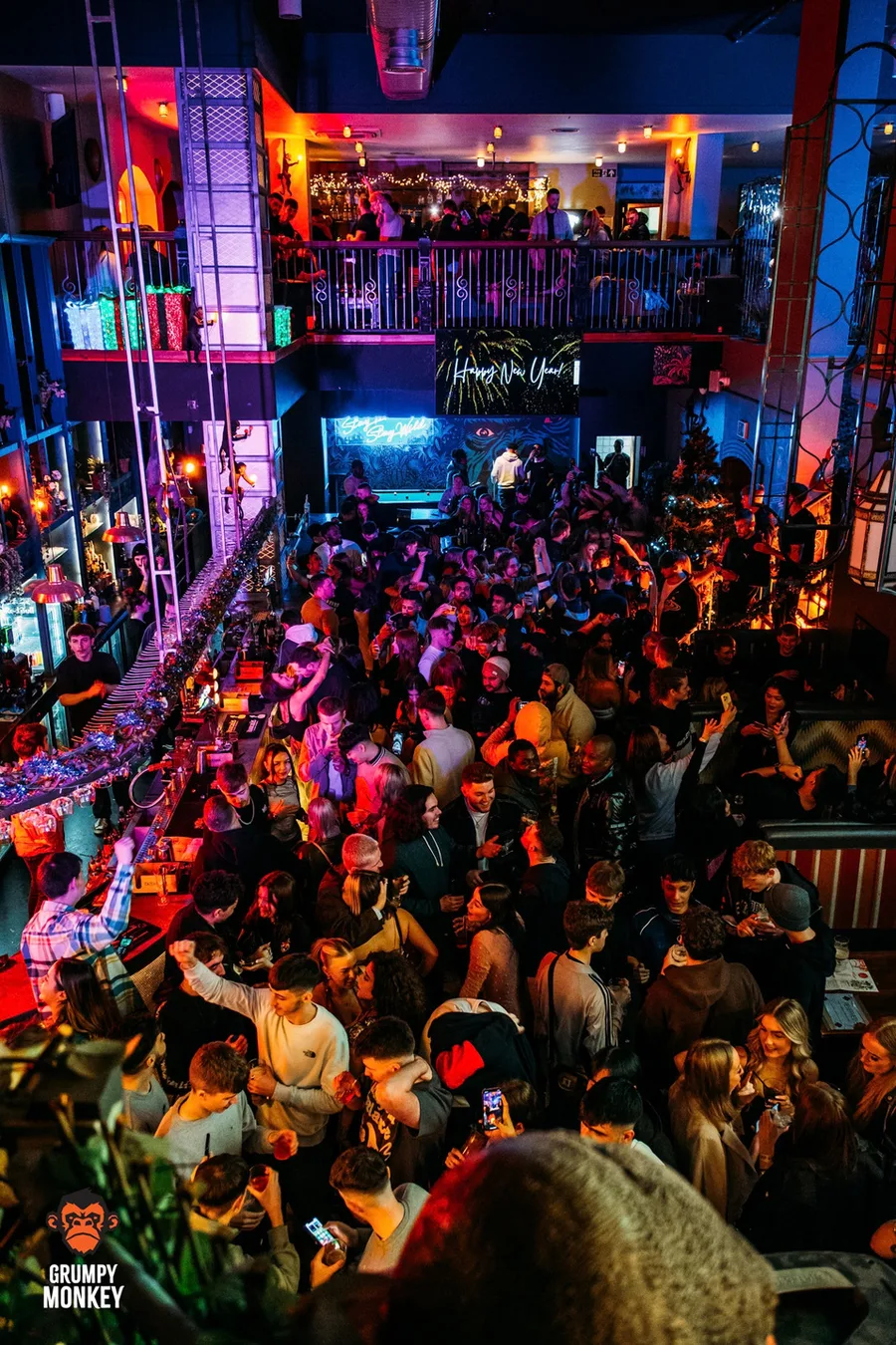 A packed night at Grumpy Monkey, the mezzanine above the bar